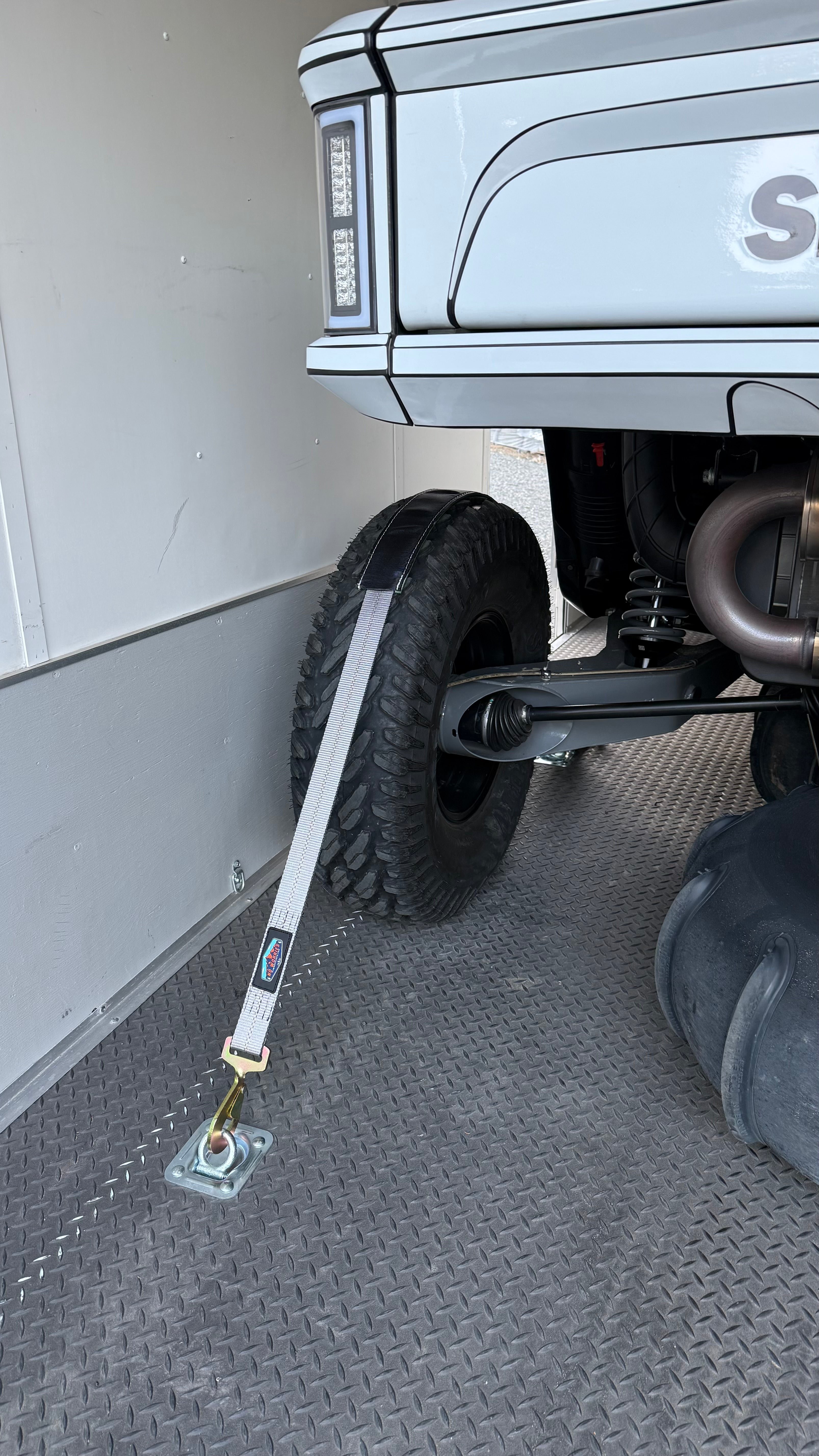 Speed Car secured with our TreadLock Tie-Downs