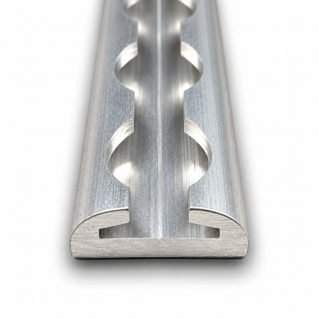 Aluminum L-Track cargo rail with rounded edges, showing the end profile and tie-down slots