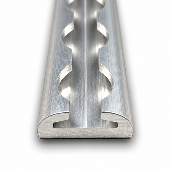 Aluminum L-Track cargo rail with rounded edges, showing the end profile and tie-down slots
